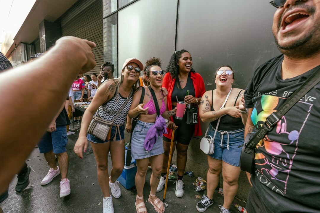 Diverse group of Brazilian young adults laughing together outdoors
