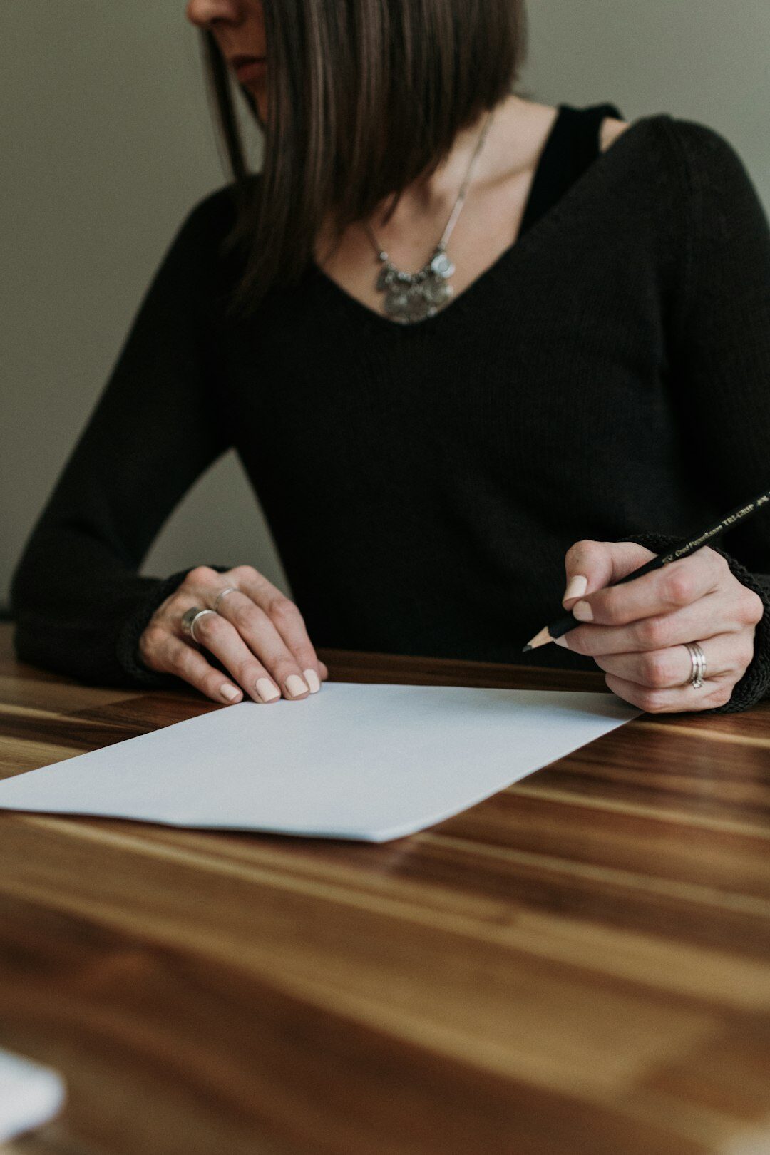person setting goals on paper