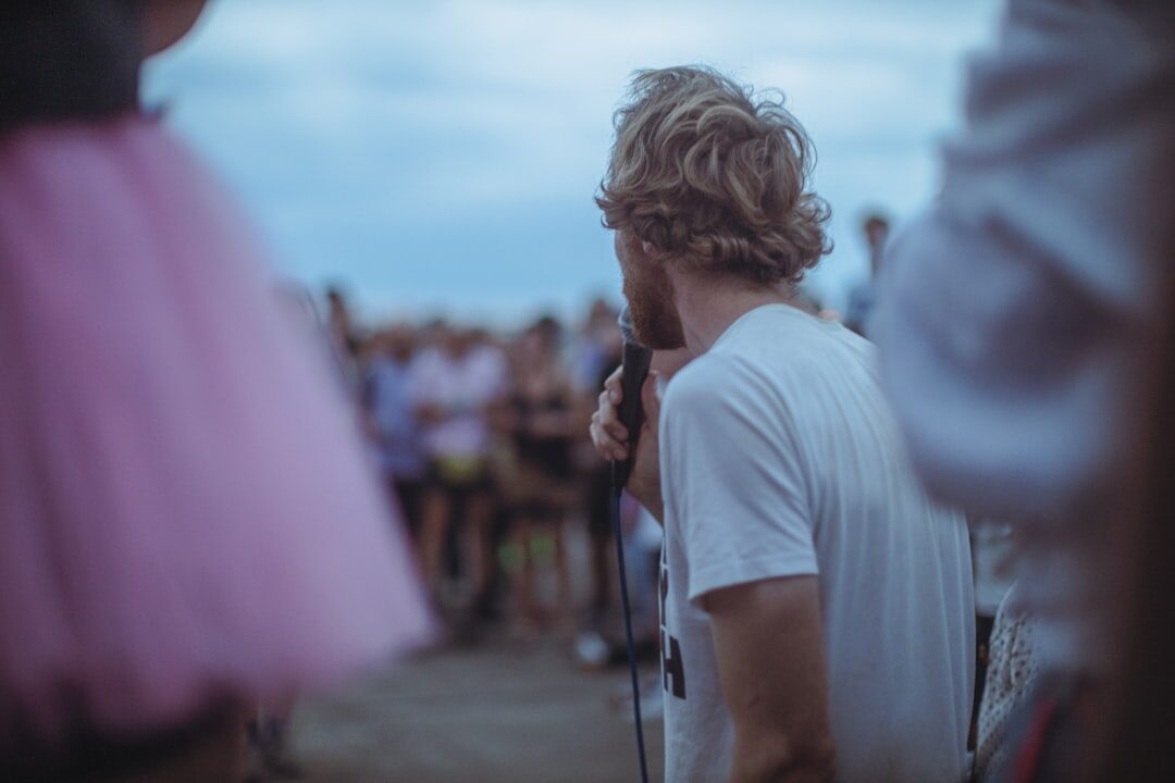 confident person speaking to crowd
